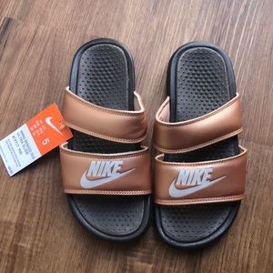 Rose gold Nike slides